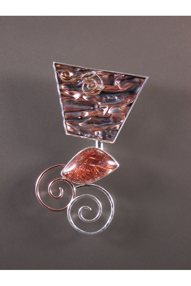 Brooch.  Folded copper, silver, 14 and 18k gold, rutilated quartz