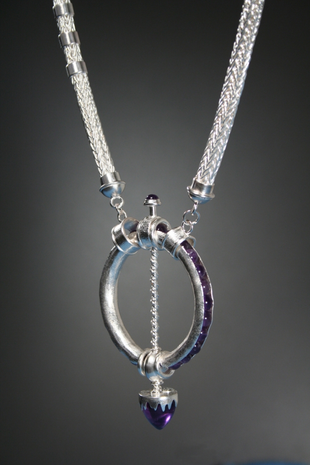 Neckpiece. Anticlastic SS, amethyst