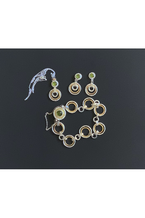 Silver and gold bracelet, earrings, and pendant set