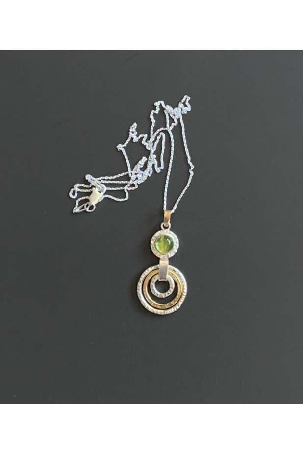 Silver and gold bracelet, earrings, and pendant set