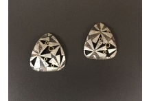 Sterling silver, 14k gold, patina.